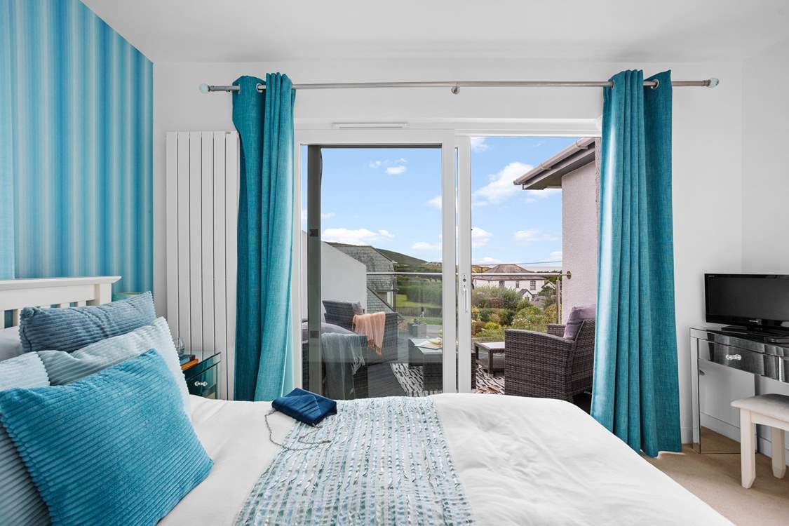 Open the patio doors and take your morning coffee outside. What a fabulous room to enjoy the views from.