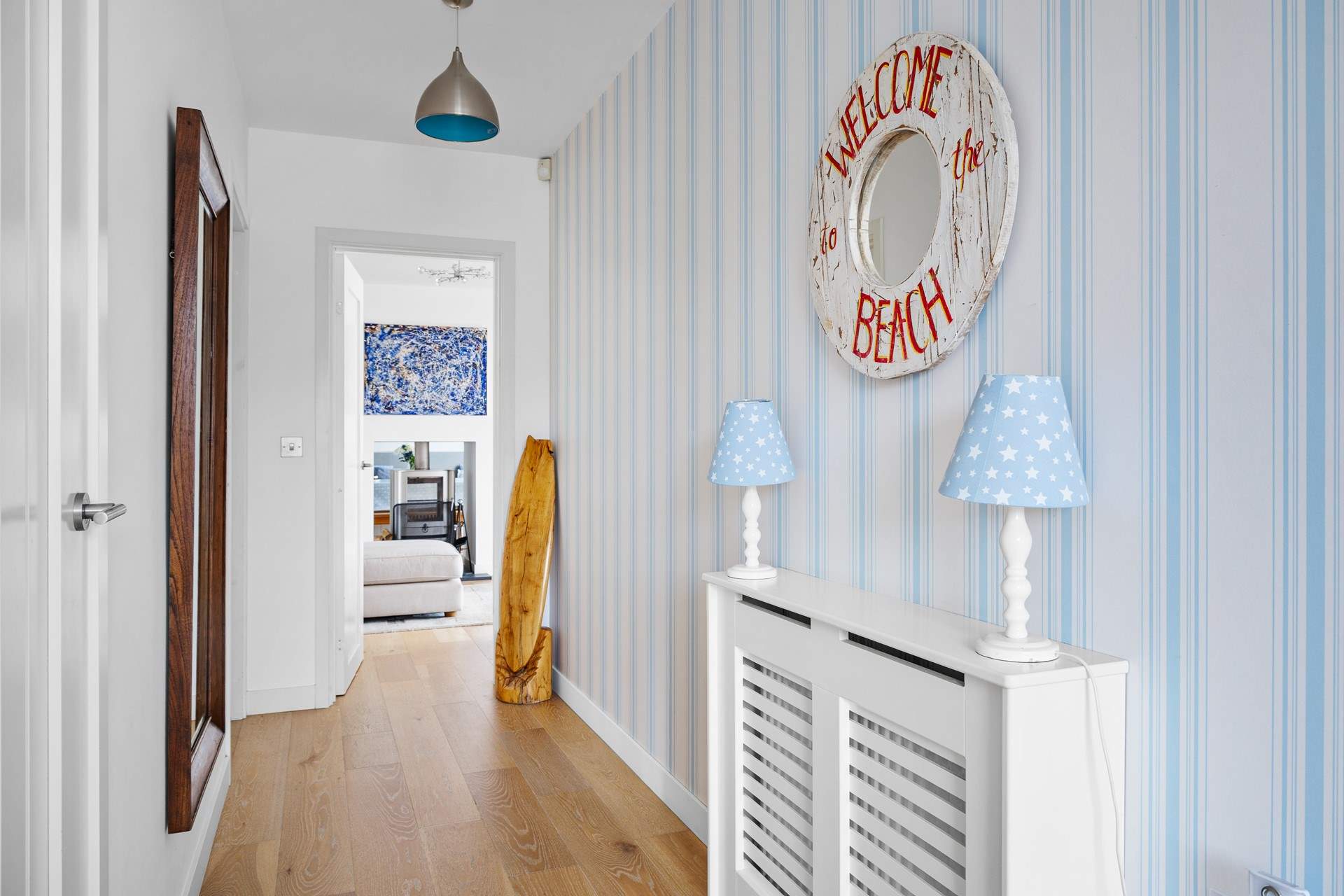 Along the hall the stairs lead up to all of the bedrooms.