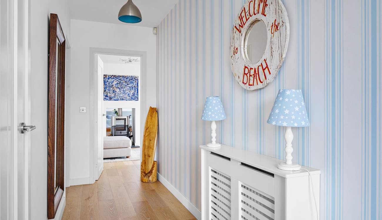 Along the hall the stairs lead up to all of the bedrooms.