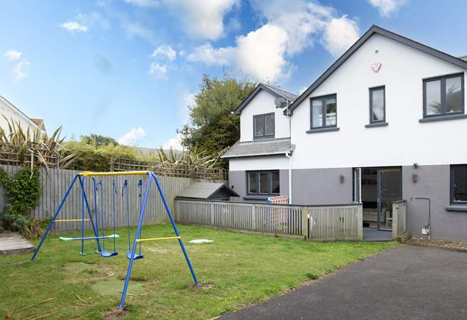 Plenty of space on the lawn for the children and family dog. 