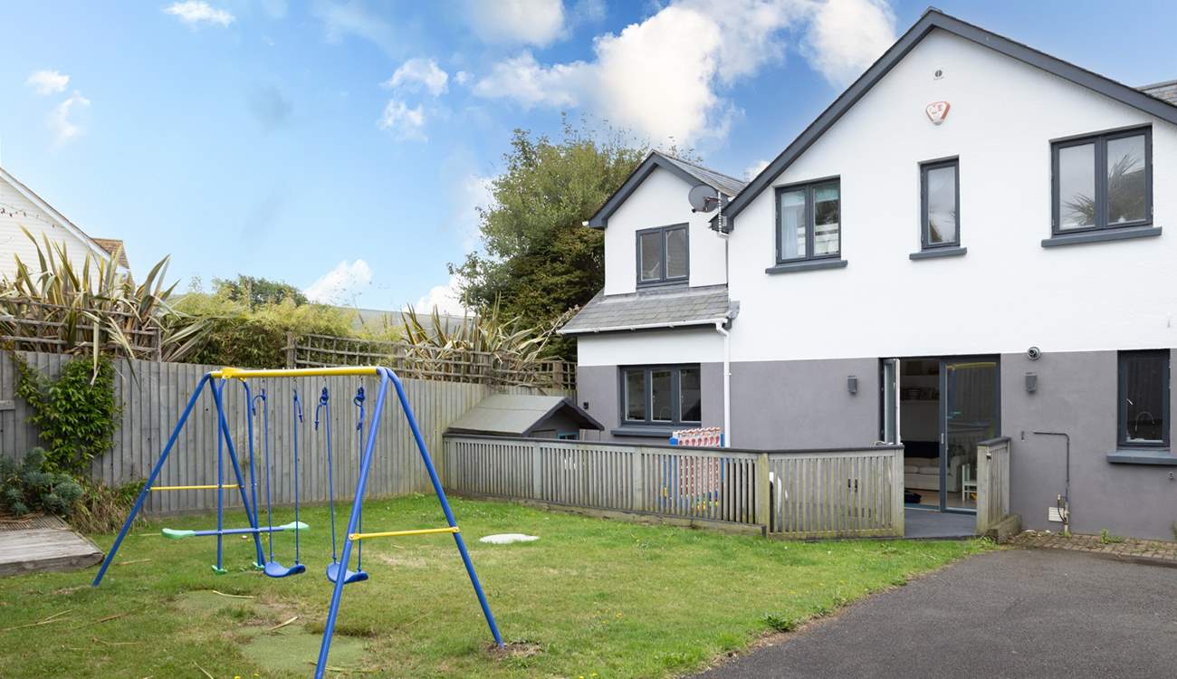 Plenty of space on the lawn for the children and family dog. 