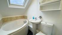 Enjoy a relaxing soak in the corner bath.