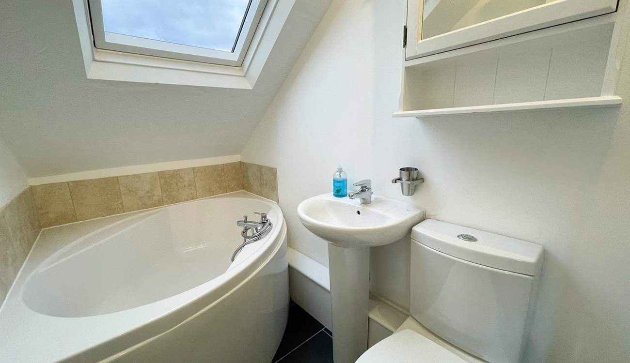 Enjoy a relaxing soak in the corner bath.