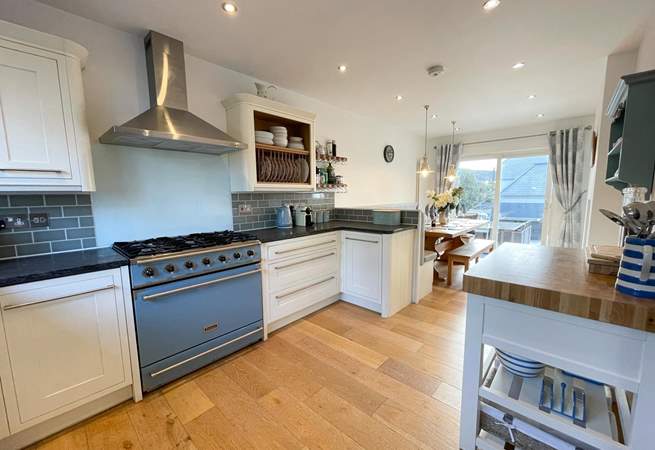 The fully equipped kitchen with a perfect dinning spot.