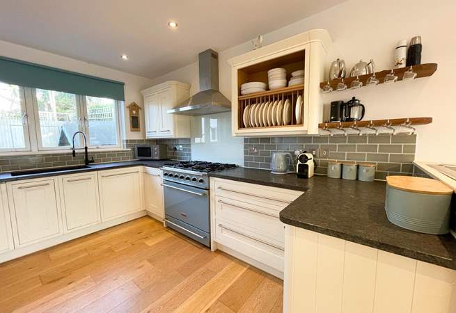 The kitchen sits to the back of the house and is fully equipped.