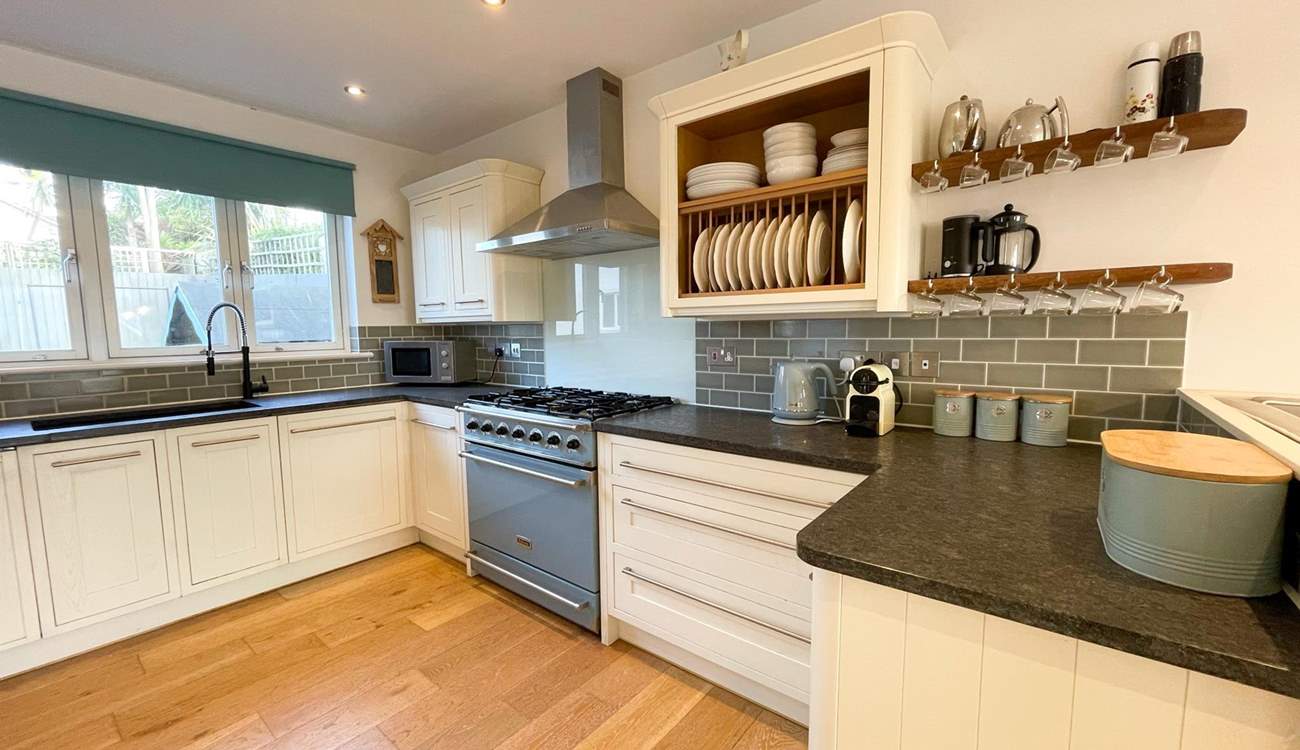 The kitchen sits to the back of the house and has all the equipment you'll need.