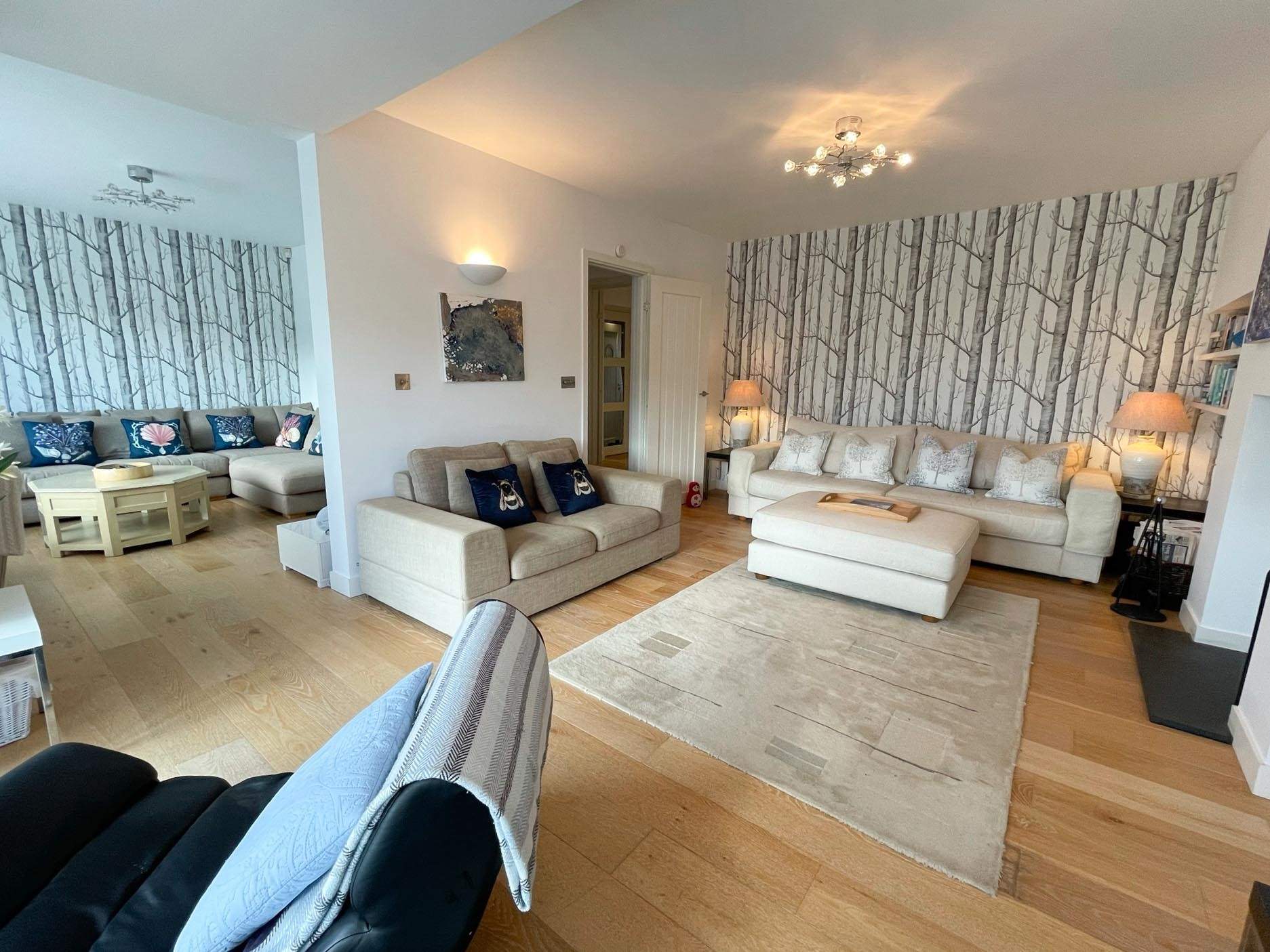 Homelands has so much space to offer. The Smart TV can be found opposite the L shape sofa.