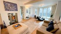 Time to enjoy the warmth of the wood-burner after a morning stroll along the beach.
