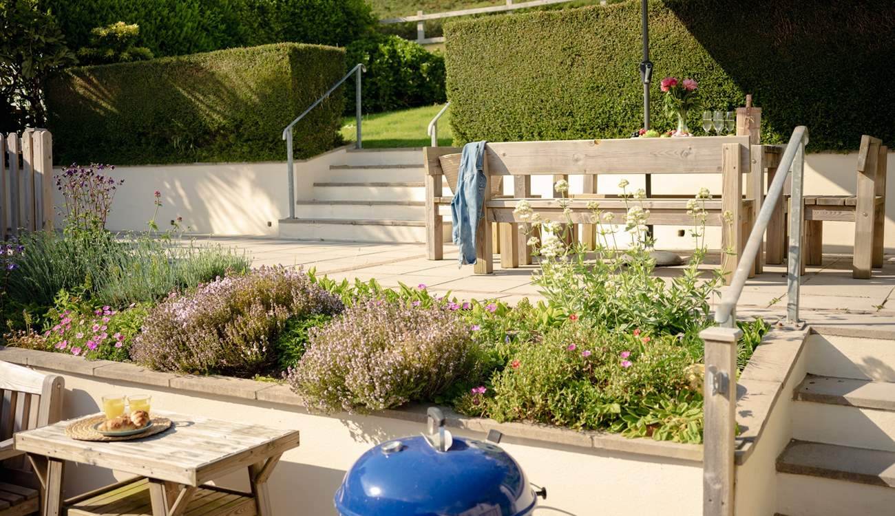 Terraced gardens offer perfect zoning.