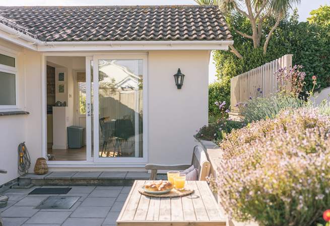 Head back upstairs and out into the garden.