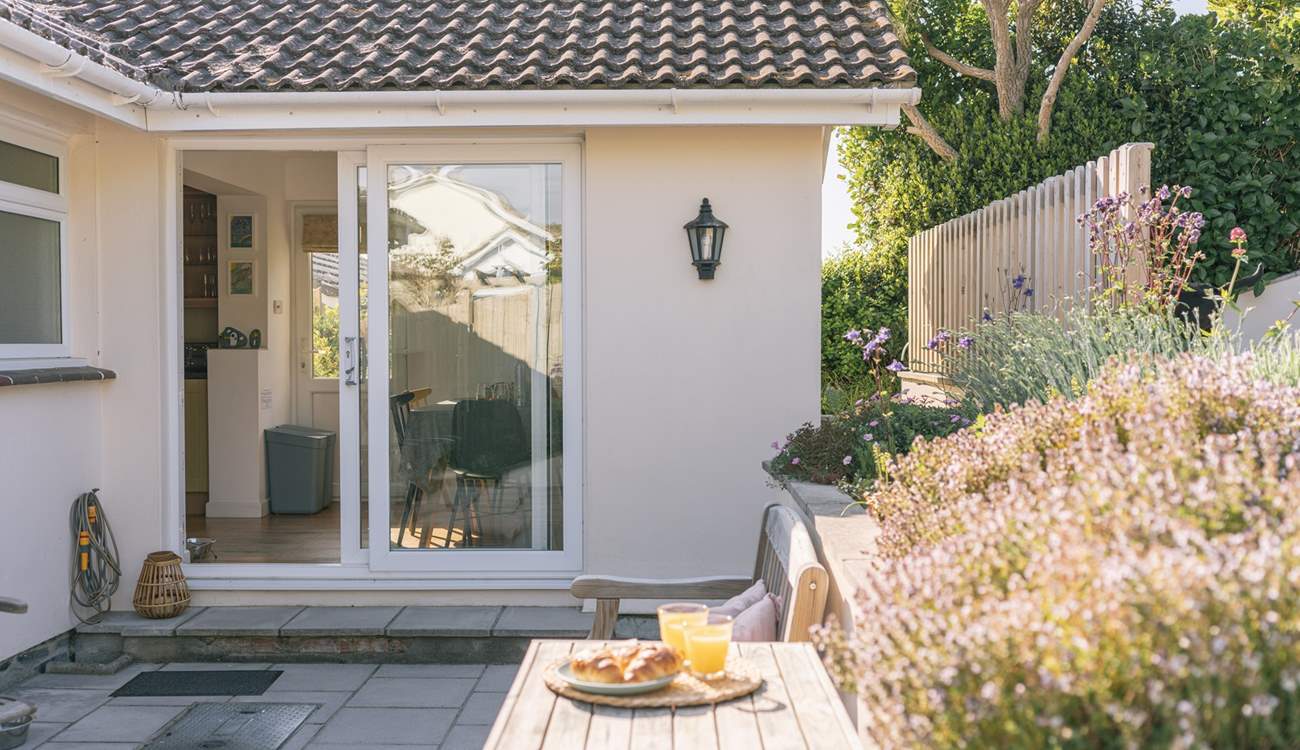 Head back upstairs and out into the garden.