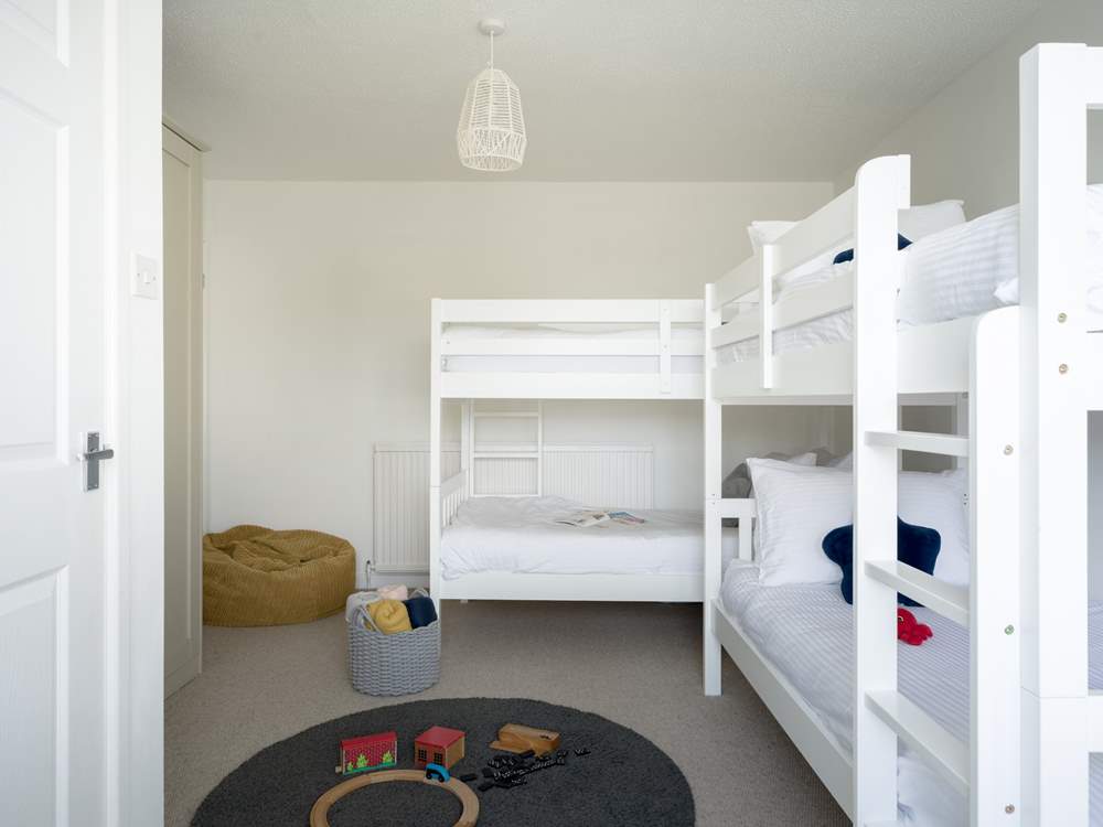On the ground floor you will find the double bunk bedroom.