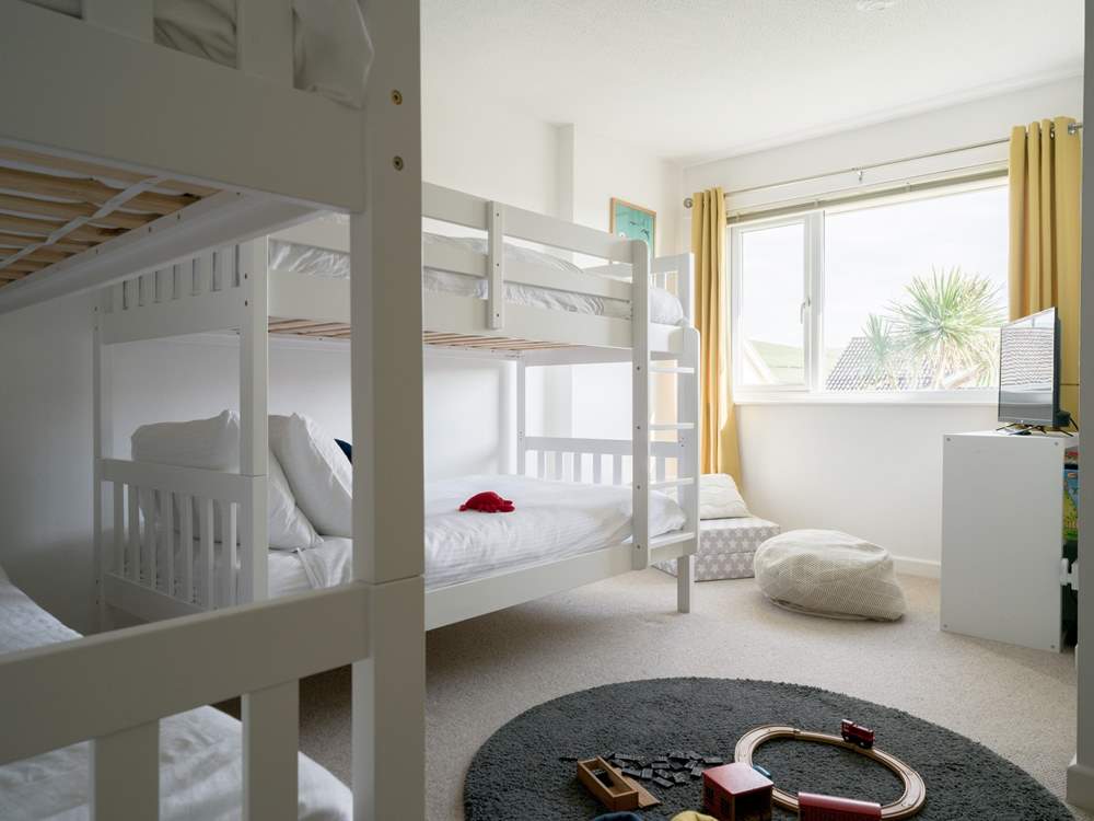 The bedroom offers a smart TV making this the perfect back out room your the younger members of the family.