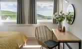 A bedroom with coast views. - Thumbnail Image