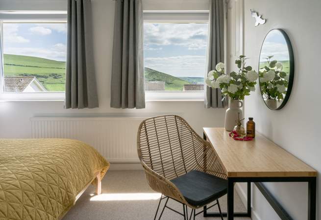 A bedroom with coastal views.