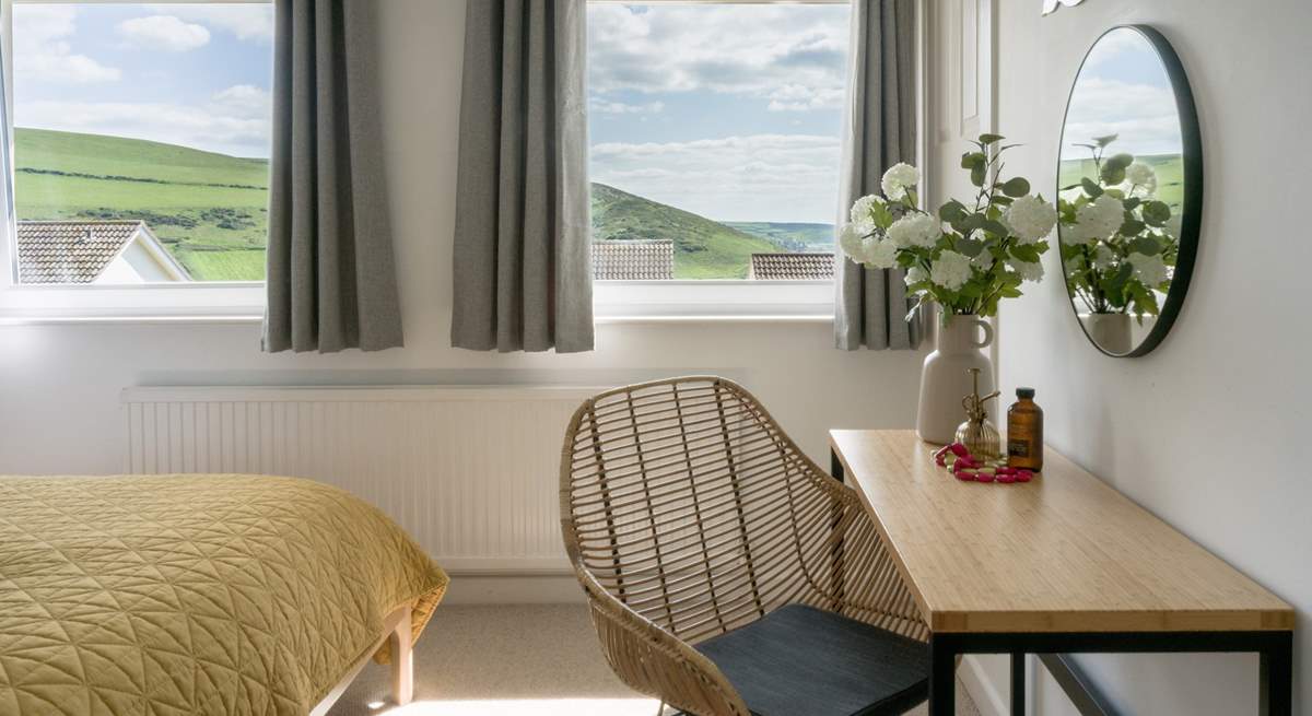 A bedroom with coast views.