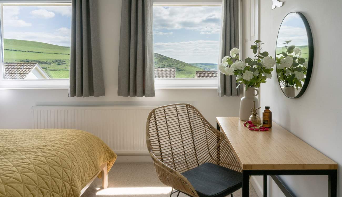A bedroom with coastal views.