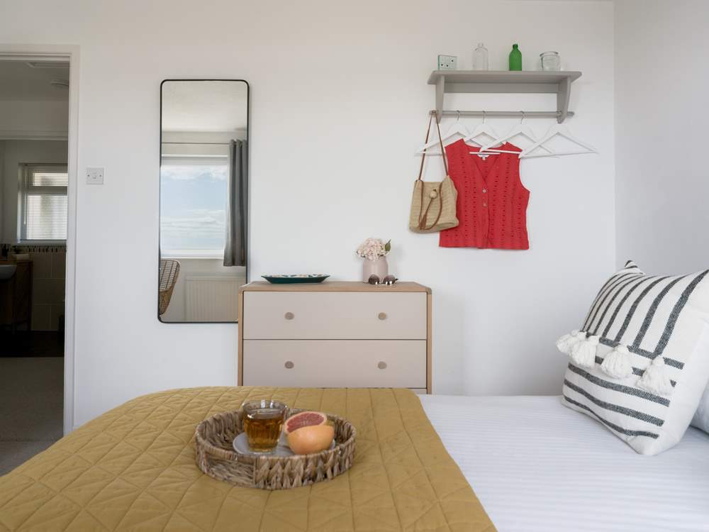 this bedroom offers a lovely sense of calm.