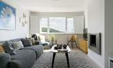 Contemporary furnishings welcome you into the first floor sitting-room.  - Thumbnail Image