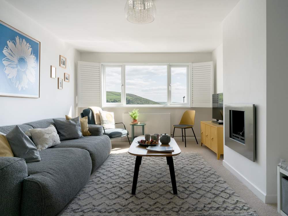 Contemporary furnishings welcome you into the first floor sitting-room.