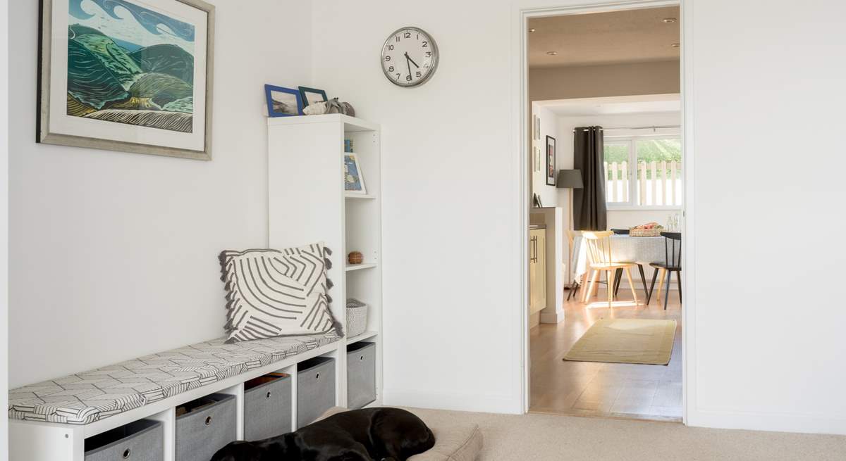 From the sitting room head to the kitchen/diner and on to the back garden. 