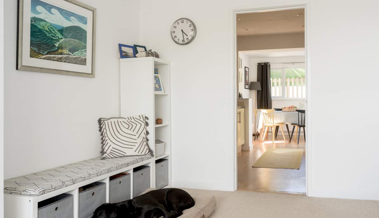 From the sitting-room head to the kitchen/diner and on to the back garden. 