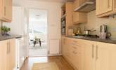 Head back through the kitchen out to the landing where you will find two of the three bedrooms as well as the family bathroom. - Thumbnail Image