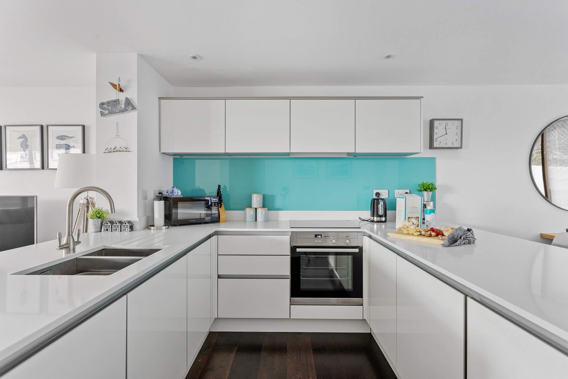 The stylish kitchen area has all the equipment you'll need. 