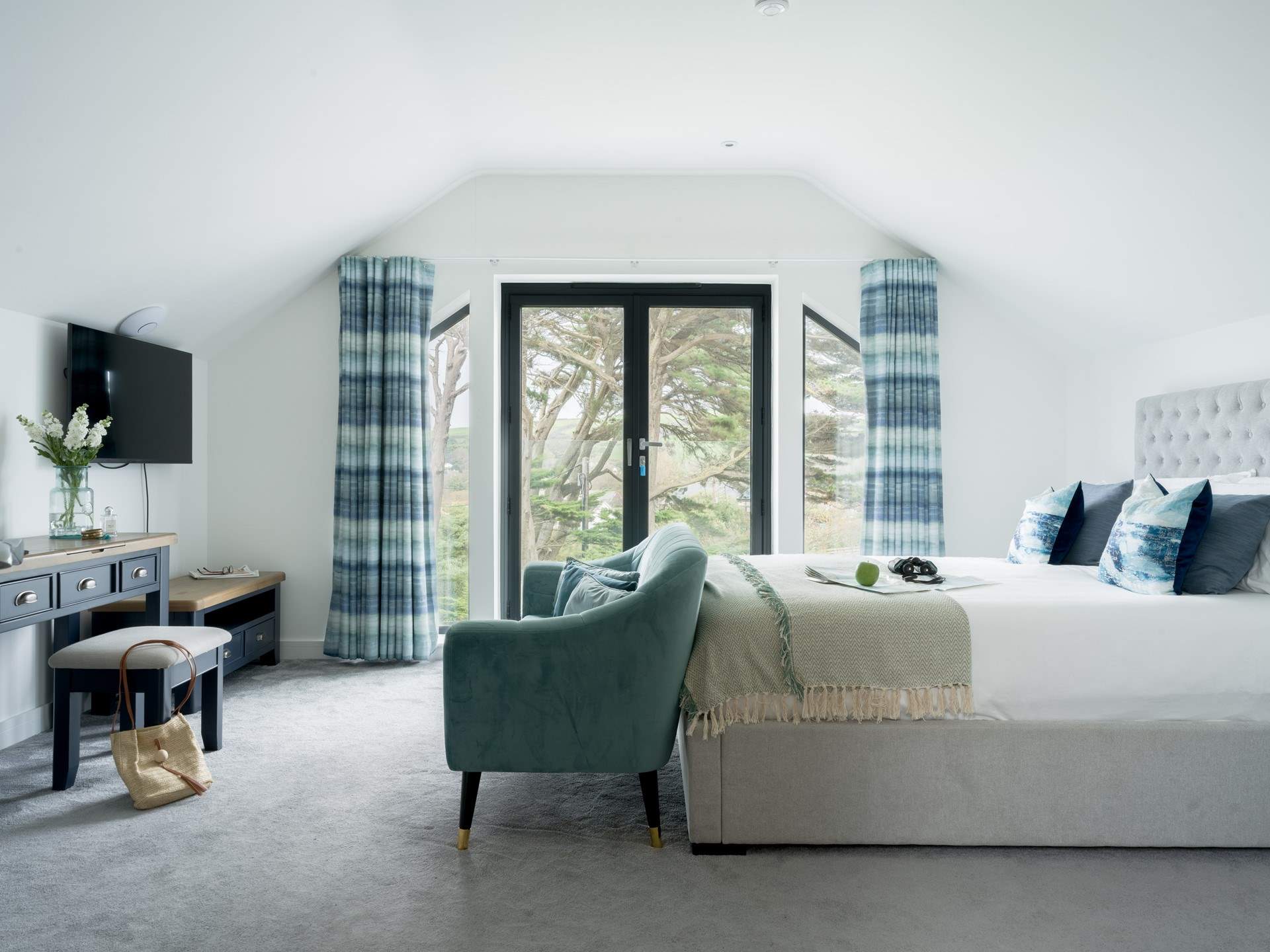 Two of the luxurious bedrooms are on the first floor. 