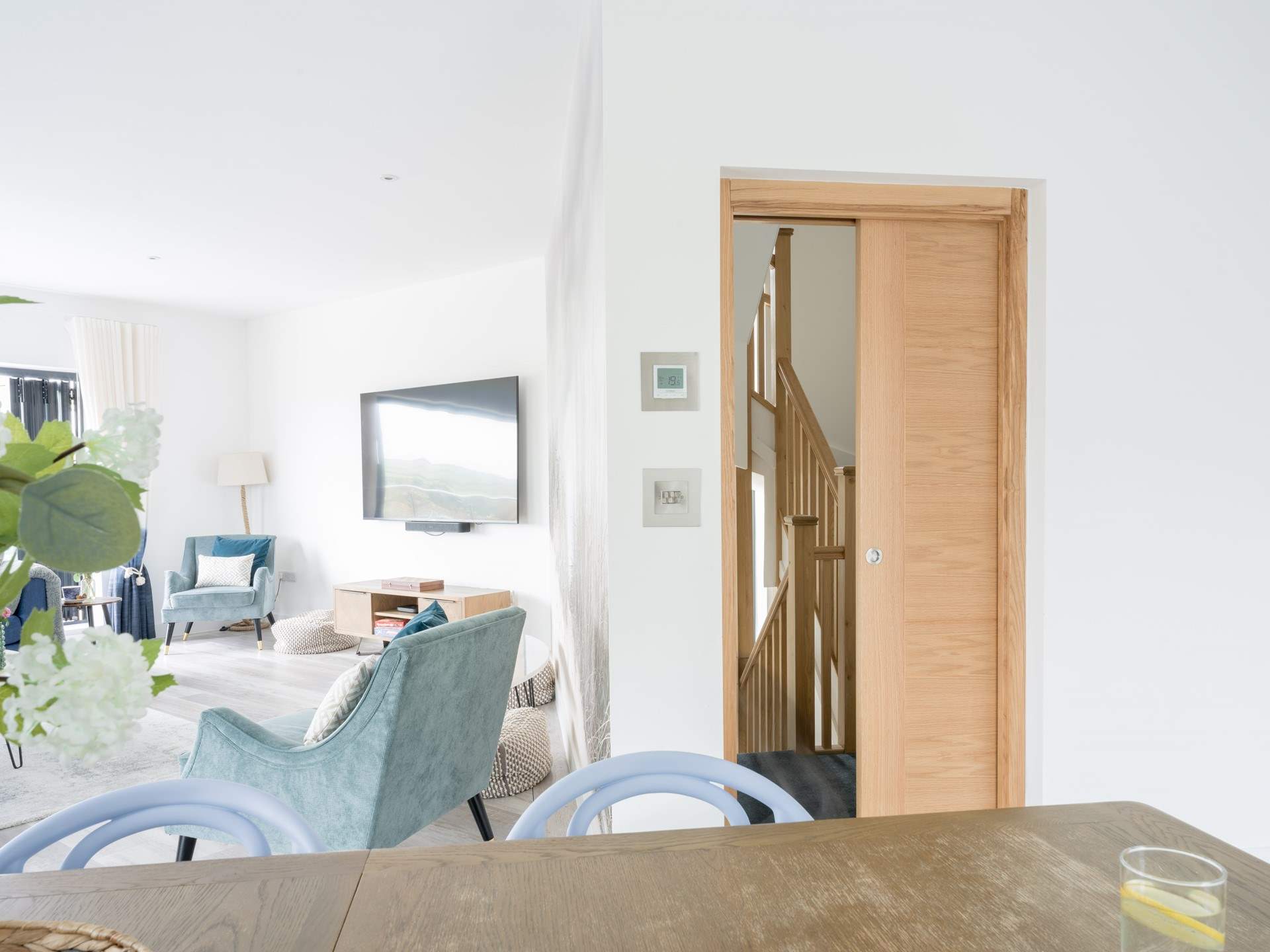 Climb the stairs to the first floor to discover the WOW room which extends out to a balcony.