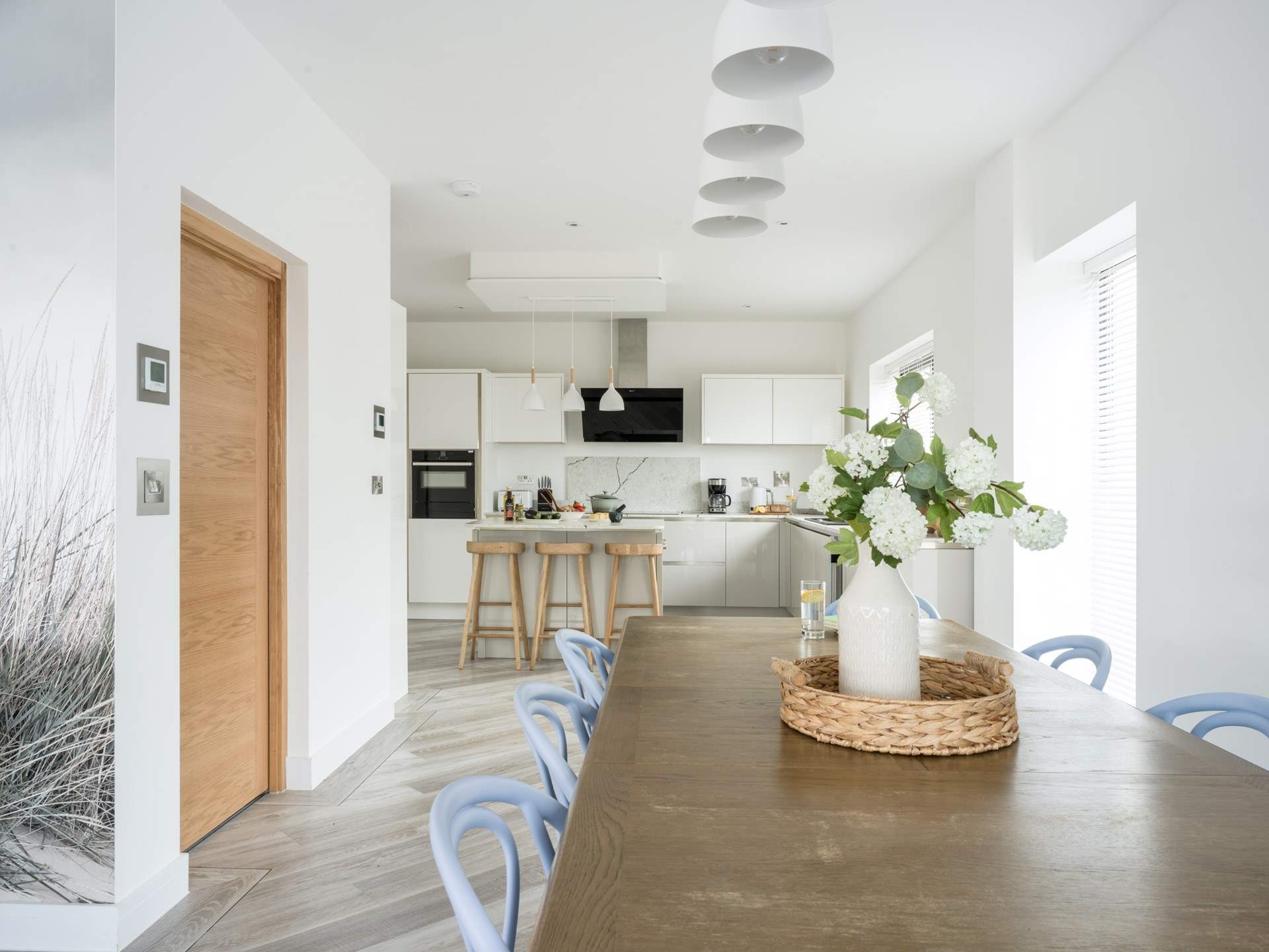 Step through the door and climb the stairs to the second floor.