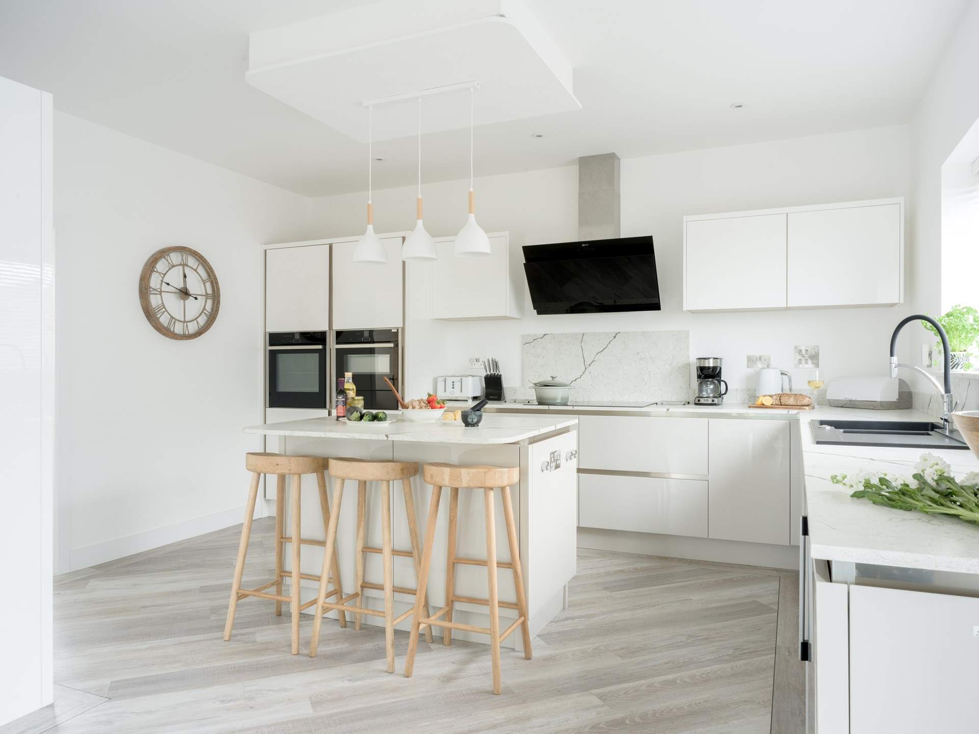 The utility area sits to the side of the kitchen perfect for storing all your holiday goodies.