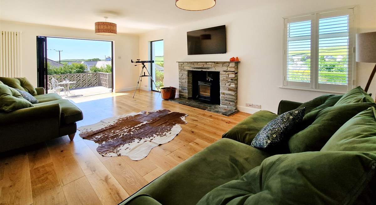 Contemporary furnishings await in the spacious sitting-room. 