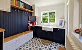 The utility area is ideal for storing coats and shoes.  - Thumbnail Image