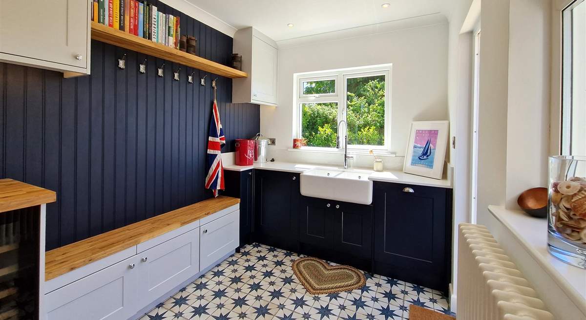 The utility area is ideal for storing coats and shoes. 
