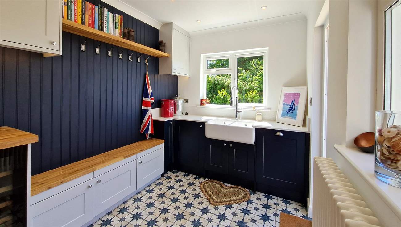 The utility area is ideal for storing coats and shoes.