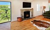 The wood-burner will keep you cosy on cooler days.  - Thumbnail Image