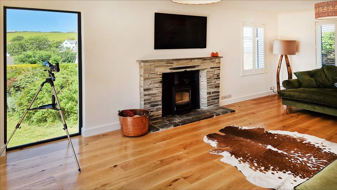 The wood-burner will keep you cosy on cooler days.