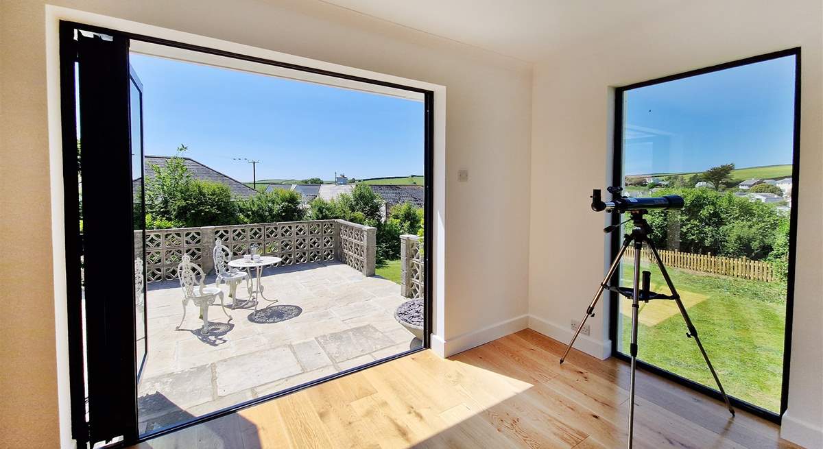 Take in the views with the telescope. 