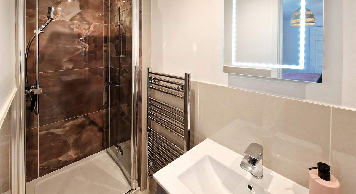 Bedroom 1 has a handy en suite shower room. 