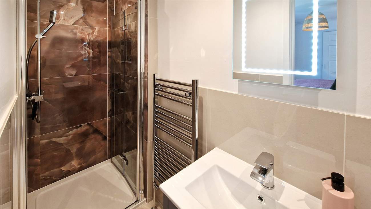 Bedroom 1 has a handy en suite shower room.