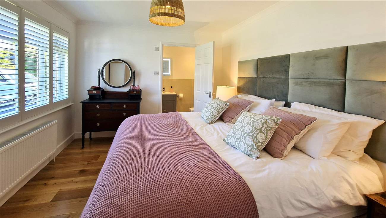 Bedroom 1 is beautifully furnished with a super-king size bed.