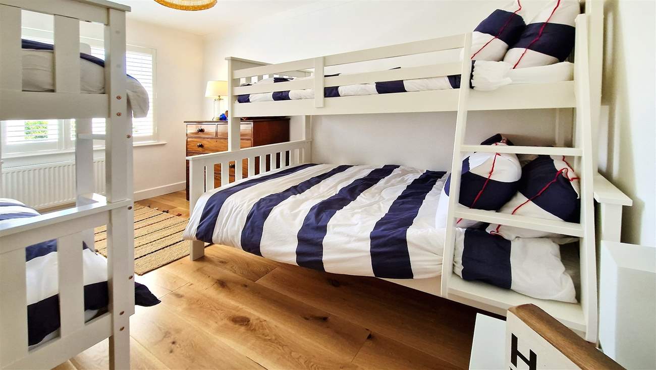 The children will love the double bunk-bed room.