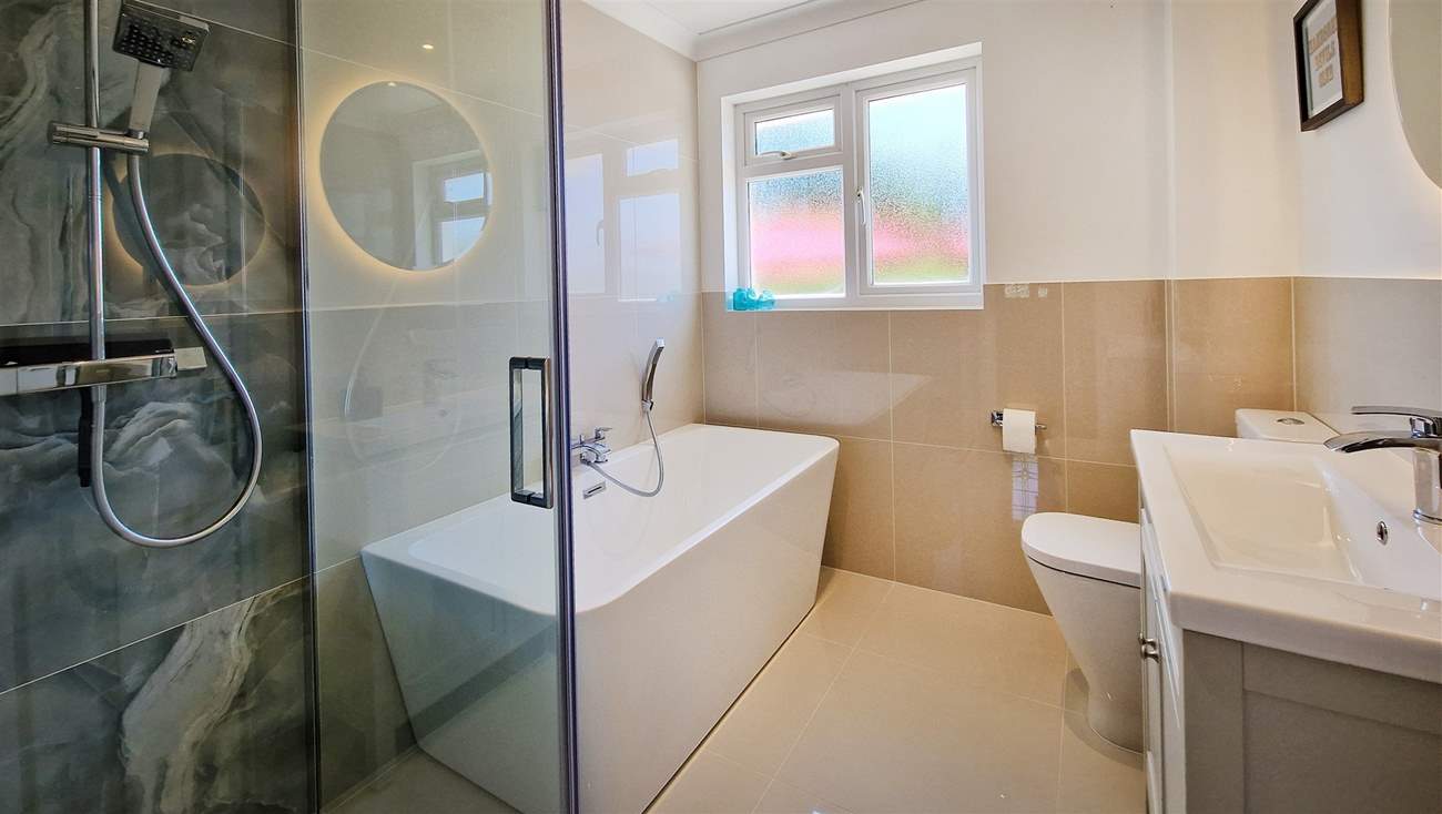 The family bathroom as a bath for a long soak after a busy beach day.
