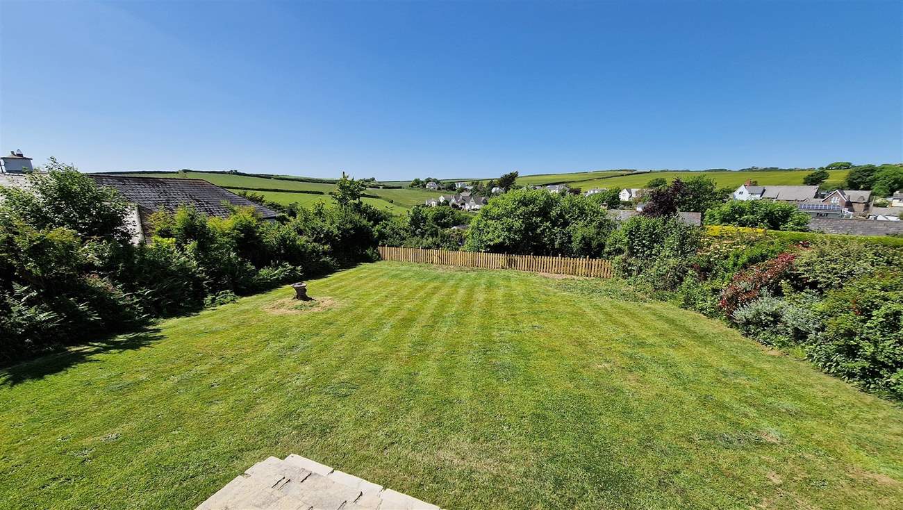 The large lawn is ideal for kids and dogs to let off steam.