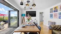 Open the bi-fold doors and let in the fresh Devon air. 