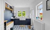 The utility area is ideal for storing coats and shoes.  - Thumbnail Image