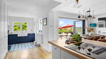 The kitchen/diner has access to the sunny terrace. 