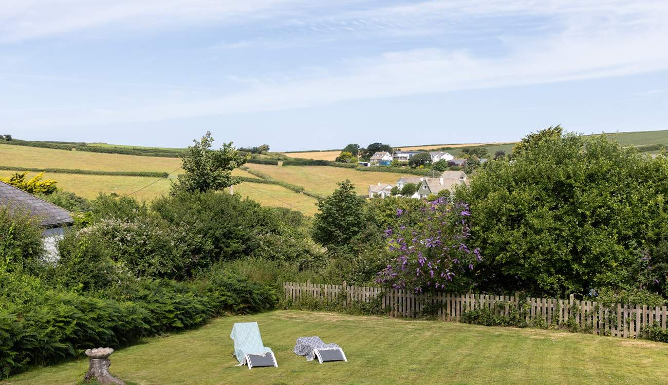 Relax on the large lawn whilst the kids and dogs let off steam.