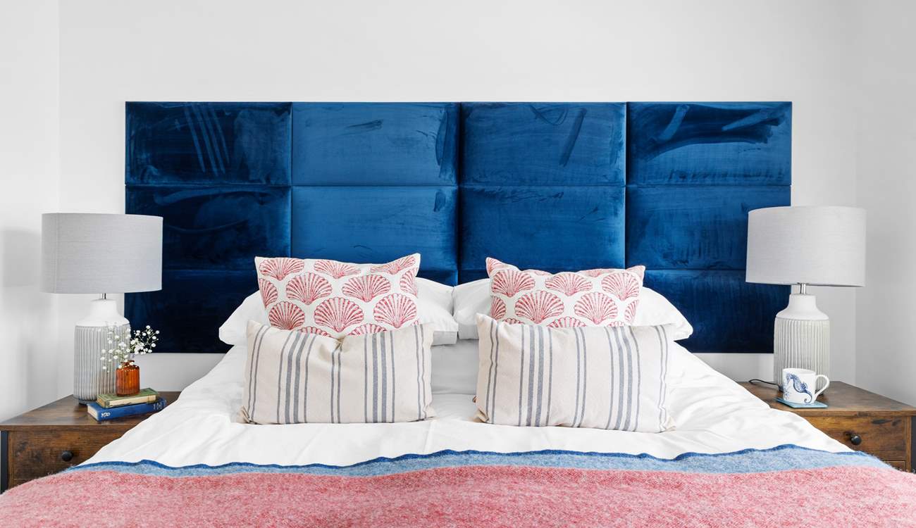 Bedroom 2 has a comfortable king-size bed.